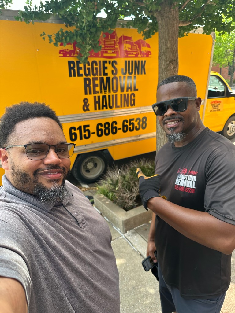 Reggie and team in front of truck